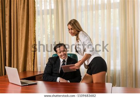 Sexy Secretary Tablet Near Boss Office