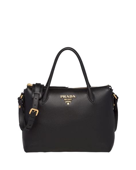 Prada bags are valued for their attention to detail, impeccable design, and timeless sophistication. Prada Daino Medium Leather Tote Bag in Black - Lyst