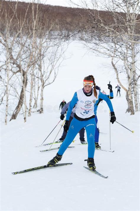 Skiers Running On Ski Track In Winter Forest All Russia Mass Ski Race