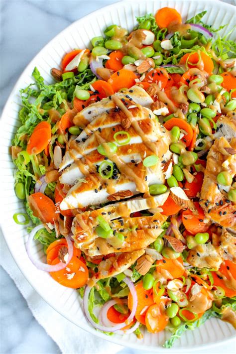 This chinese chicken salad recipe is a little sweet and a little crunchy with lots of veggies and protein. Asian Chicken Salad with Peanut Dressing - #foodbyjonister