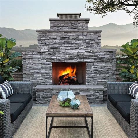 The stone fireplace is a structure in ark: Top 60 Best Stacked Stone Fireplace Ideas - Interior Designs