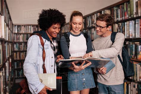 Group Of Students Learning In Library At University Stock Photo 16c