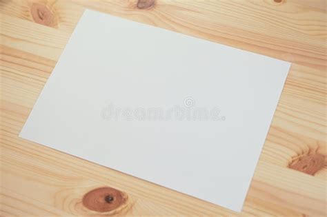 Close Up Blank White Paper On Brown Wood Table Stock Image Image Of