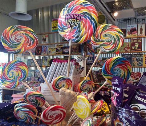 There Are Many Lollipops On Display In The Store