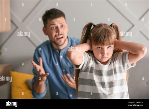 Angry Father Scolding His Little Daughter At Home Stock Photo Alamy