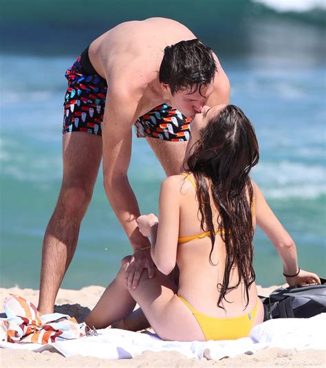 Ansel Elgort And Violetta Komyshan Kissing On The Beach