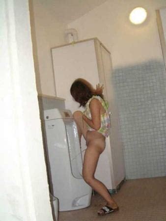 Xxx Women Pissing In Men S Urinal