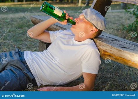 Alcoholic Man Drinking From A Bottle Of Wine Stock Image Image Of