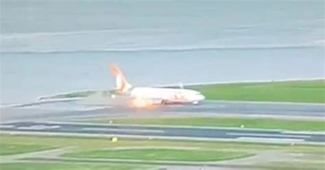Passengers Shock As Planes Engine Bursts Into Flames On Runway