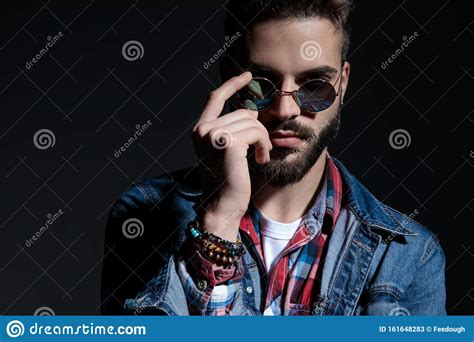 Tough Casual Man Taking Off His Sunglasses Stock Image Image Of Background Elegant 161648283