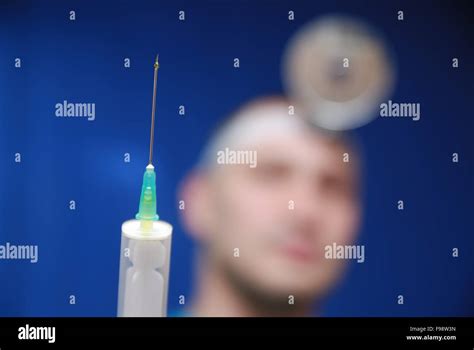 Doctor With Injection Stock Photo Alamy
