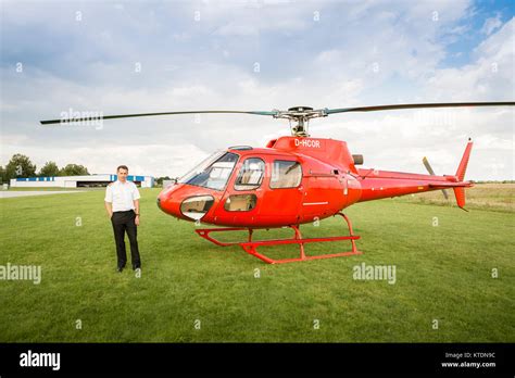 Red Colour Helicopter Hi Res Stock Photography And Images Alamy