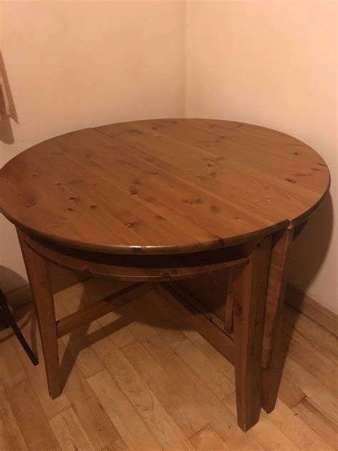 Solid pine round/oval drop-leaf extendable dining table - ikea Laurila