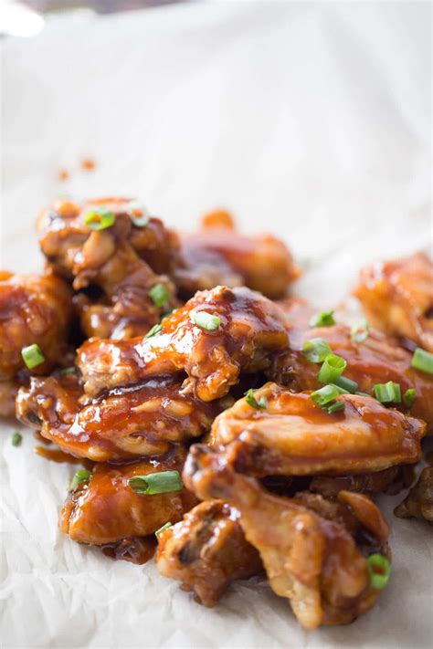 Bake in the preheated oven until golden and no longer pink in the centers, 40 to 45 minutes. Sticky Stout Baked Chicken Wings Recipe - LemonsforLulu.com