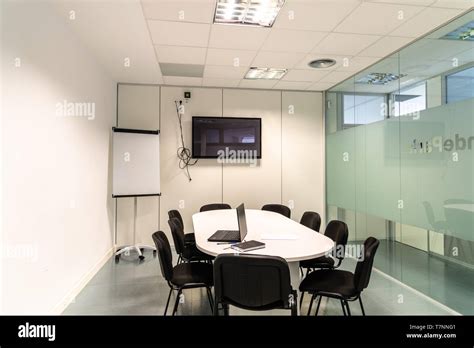 Modern Conference Room With Furniture Tv And Whiteboard Stock Photo Alamy