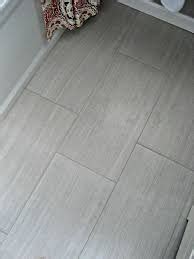 Grey grout is a beautiful choice for white tiles as the slight contrast in color helps make the white tile pop. Light Grey Floor Tile Grout | Floor Tiles