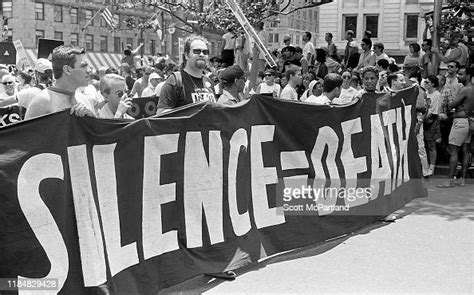 Gay Rights Activists Holding A Banner That Reads Silence Death