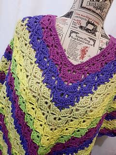 Lacy ponchos, ponchos with holes, with buttons and flowers all are here to make you say wow with their fascinated colors and designs. Ravelry: Sweet Love Poncho pattern by Buttonnose Crochet