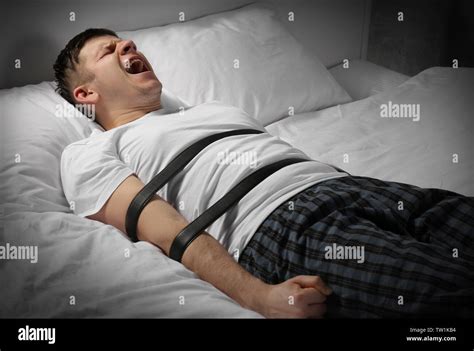 Man Tied To Bed Hi Res Stock Photography And Images Alamy