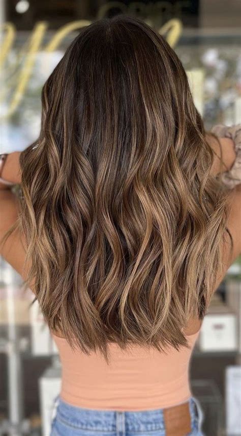 40 trendiest hair colors for 2022 sun kissed beach vibe brown hair balayage brown hair