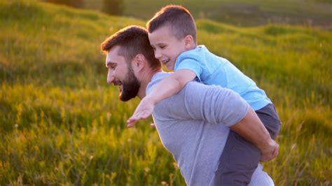 Joyful Father Son Playing Together In Field Stock Footage Sbv 324244425