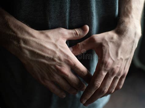 Tanned Hands With Protruding Vessels Of A Young Guy Hands Stock Image