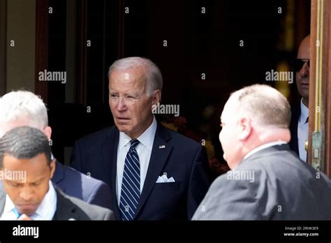 President Joe Biden departs after paying respects to former