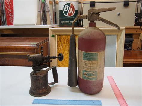 Looking for old fire extingusher? Vintage Torch and Fire Extinguisher