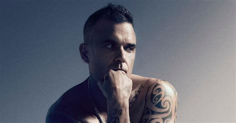 Robbie Williams Strips Naked But Admits Computer Trickery Kept Him