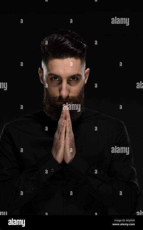 Portrait Of A Young Man Folding His Hands Stock Photo Alamy