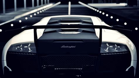 Black And White Lamborghini Sports Coupe At Nighttime Hd Wallpaper
