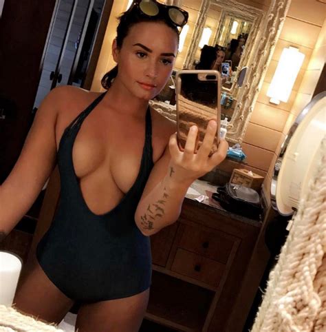 Demi Lovato Puts Her Boobs On Display In Plunging Swimsuit For Sizzling Selfie