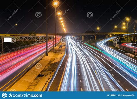 Speed Traffic Light Trails On Motorway Highway At Night Long