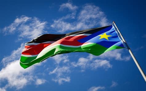 bela bandeira do estado nacional do sudão tremulando foto premium