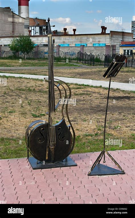 Musical Statues A Instruments From Bronze In Street Of Chelyabinsk