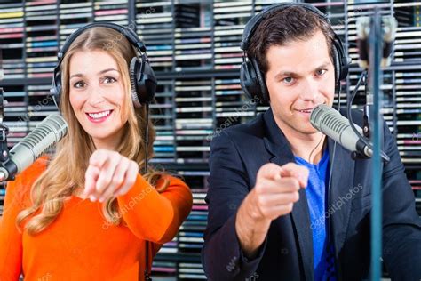 Radio Presenters In Radio Station On Air — Stock Photo © Kzenon 82582544