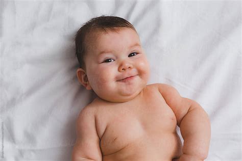 Chubby Infant Baby Nude On Bed Sheet By Stocksy Contributor Giorgio