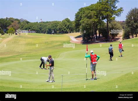 Professional Golfers Putting On The Green At The Emirates Australian