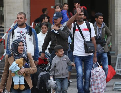 Refugees Arrive In Germany And Austria As Fresh Calls For Action In Syria Daily Mail Online