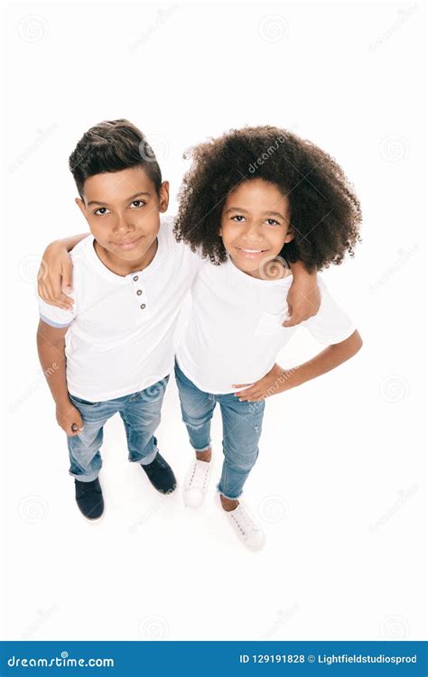 High Angle View Of Happy African American Children Embracing And