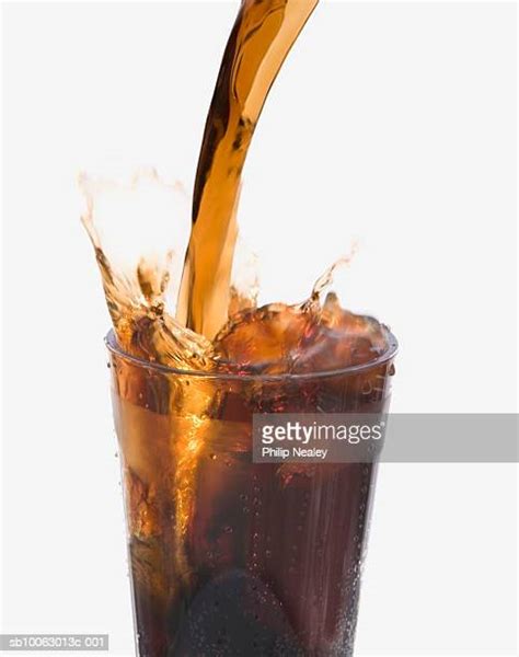 Coke Glass Splash Photos And Premium High Res Pictures Getty Images