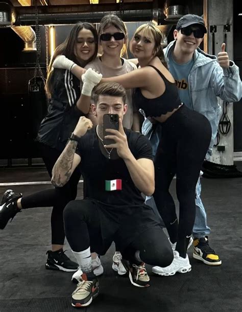 A Group Of People Taking A Photo Together