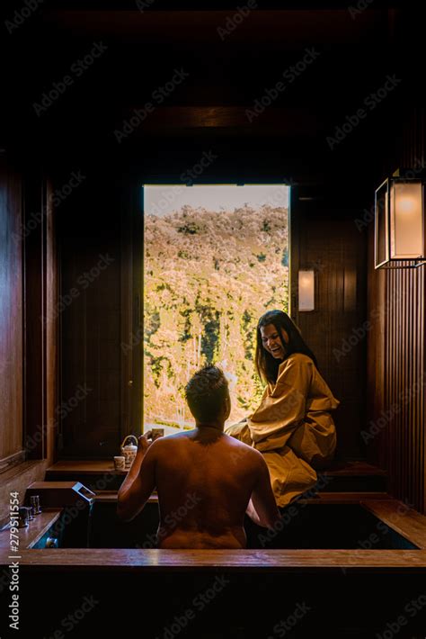 japanese onsen spa couple men and woman drinking thee onsen spa japanese onsen bath in