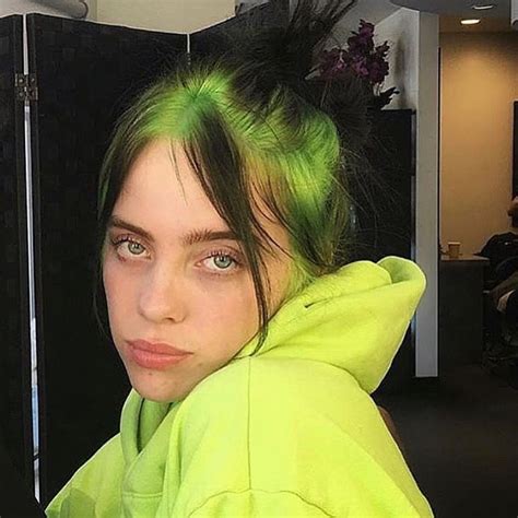 Billie eilish background black green with images billie eilish. Her eyes literally change colors to whatever color she ...