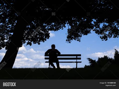 Old Man Sitting Alone On Park Bench Image And Photo Bigstock