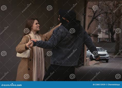 woman defending herself from attacker with knife in alley stock image image of defending