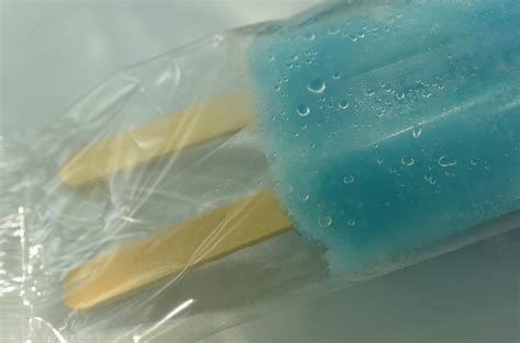 Blue Popsicle In Plastic Wrapper Photograph By Marie Kazalia Fine Art