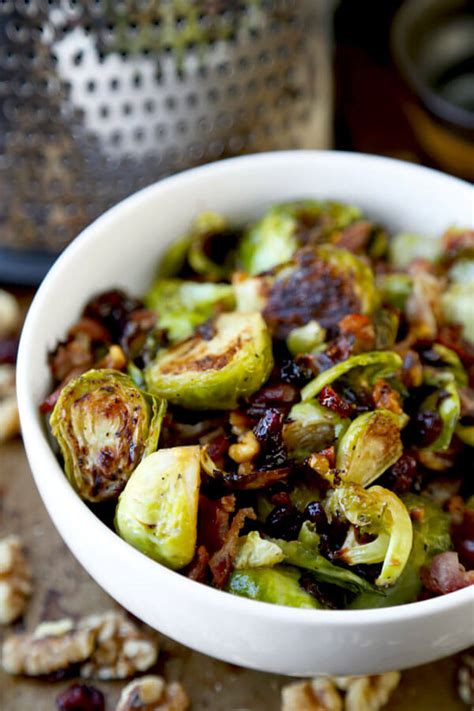 They are the perfect combination of sweet and salty, and make for perfect snack leftovers straight from the fridge the next day! Oven roasted Brussels sprouts with bacon, cranberries and walnuts - Pickled Plum Food And Drinks