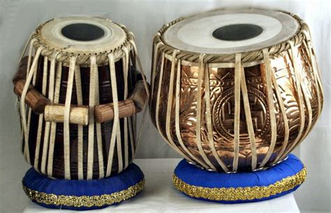 Tabla Drums Are Typically An Indian Instrument That Are Played By Using