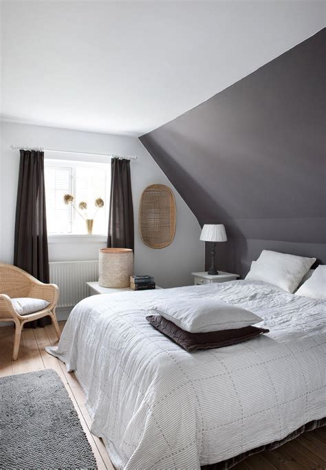 An attic room with slanted ceilings can sometimes lack natural light and feel a bit cramped, so choosing the right color to paint the space can make a big difference in how large and bright the room looks. attic design #atticrenovationslantedceiling # ...